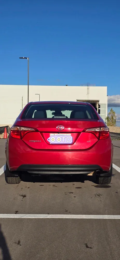 Red Toyota Corolla 2017 LE Sedan image indicator(2)
