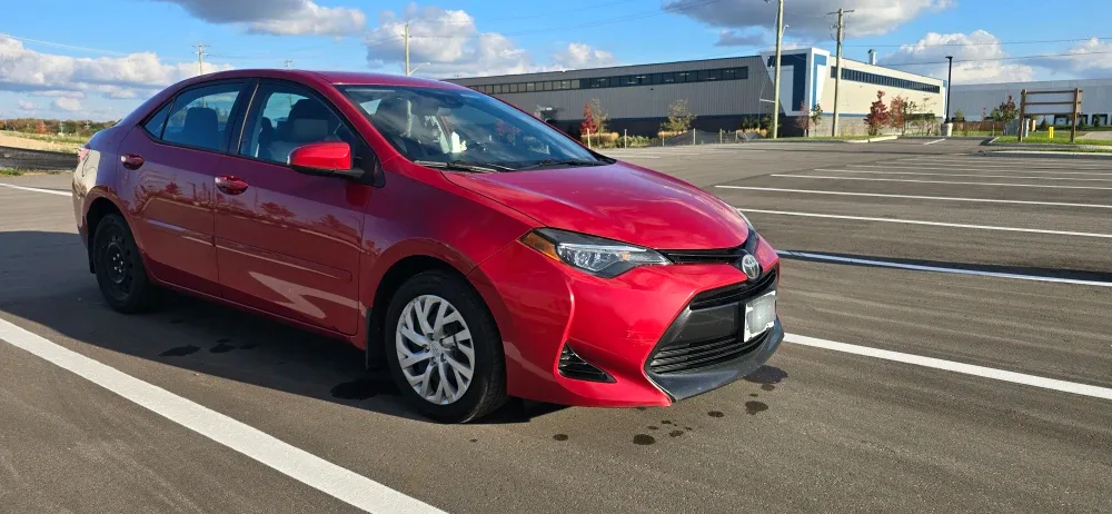 Red Toyota Corolla 2017 LE Sedan image indicator(10)