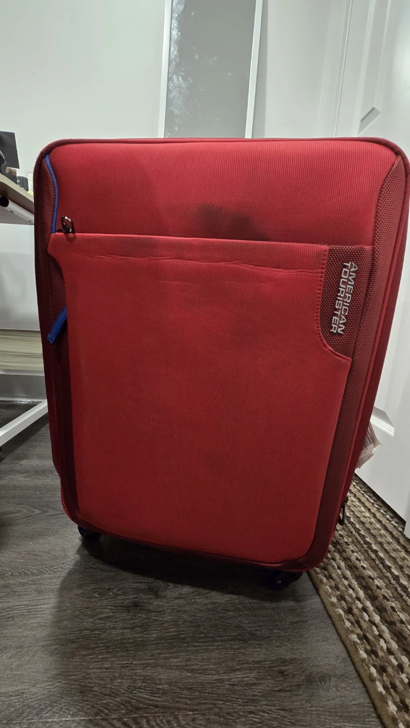 American Tourister Red Suitcase