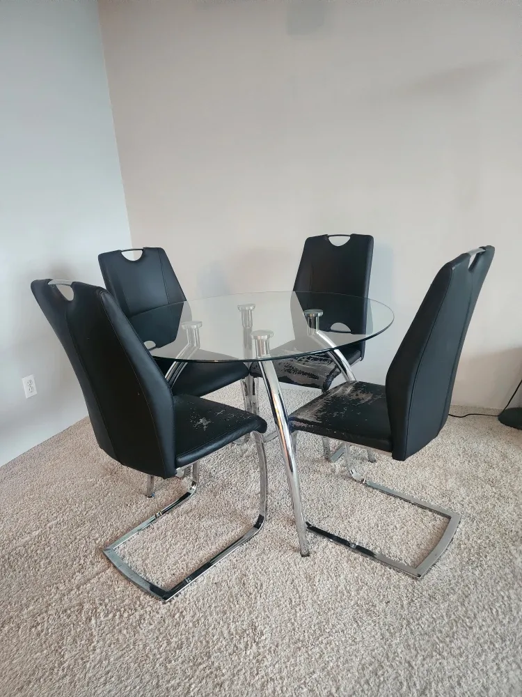 Glass top round dining table with 4 chairs