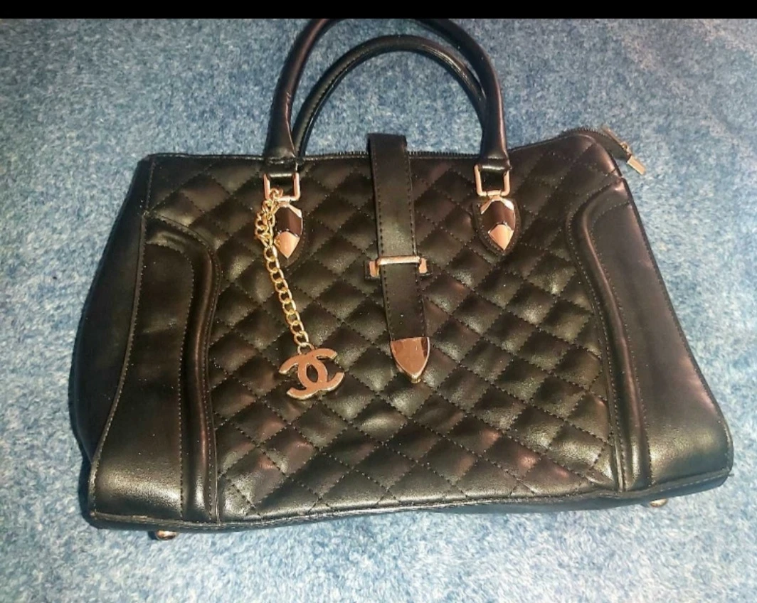 Black Quilted Handbag with Charm