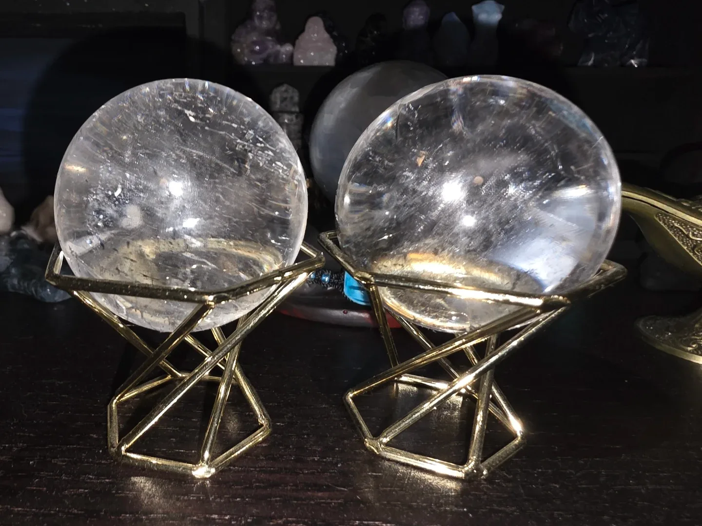 Two clear quartz Crystal spheres with Gold Stands image indicator(2)