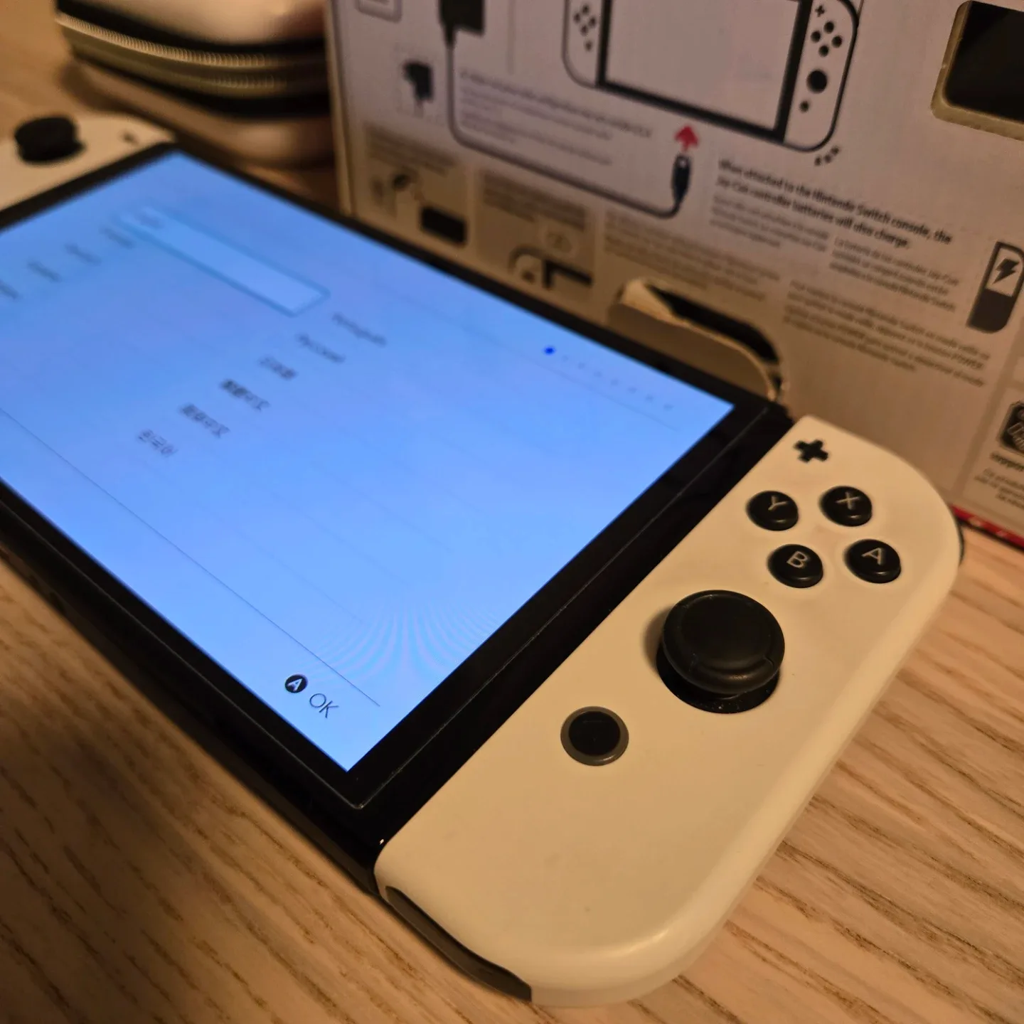 Nintendo Switch OLED like new in box. With extras image indicator(2)