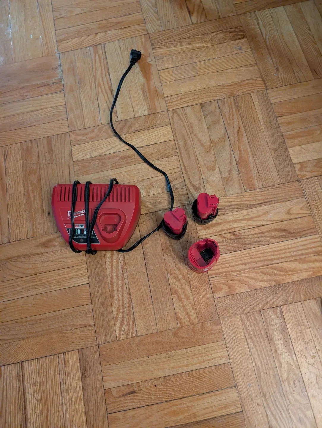 Milwaukee M12 Battery Charger & 3 Batteries