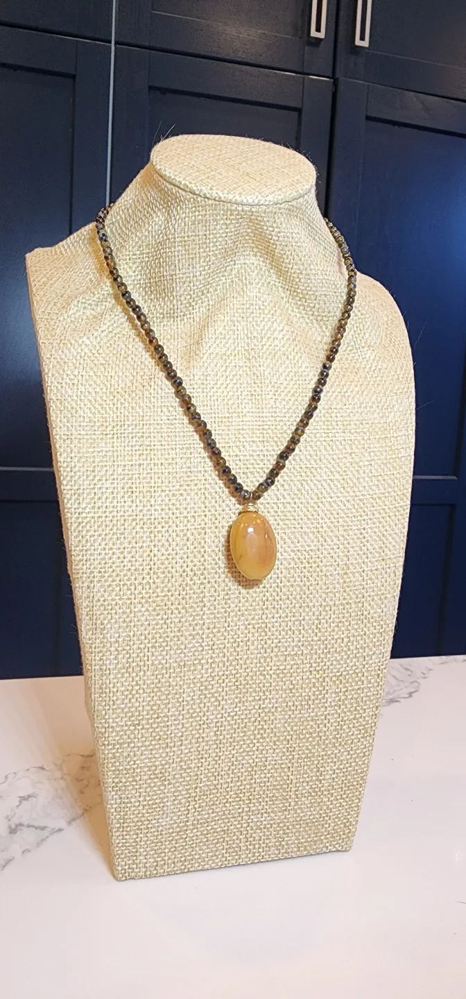 Elegant Beaded Necklace with Amber-Tone Pendant image indicator(2)