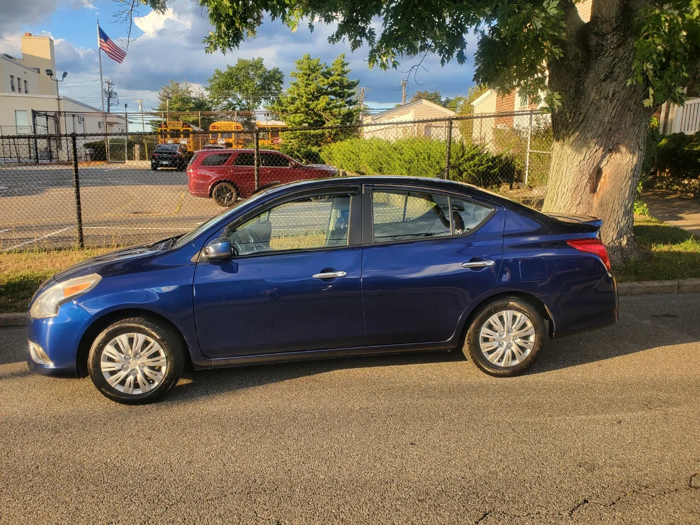 Blue Nissan Versa Sedan