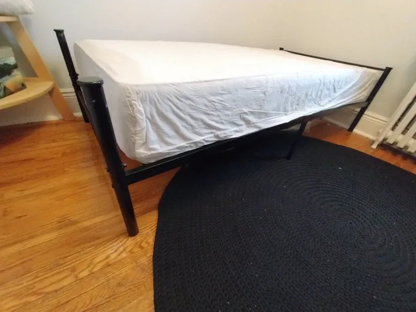 Black Metal Bed Frame with mattress and sheets image indicator(3)