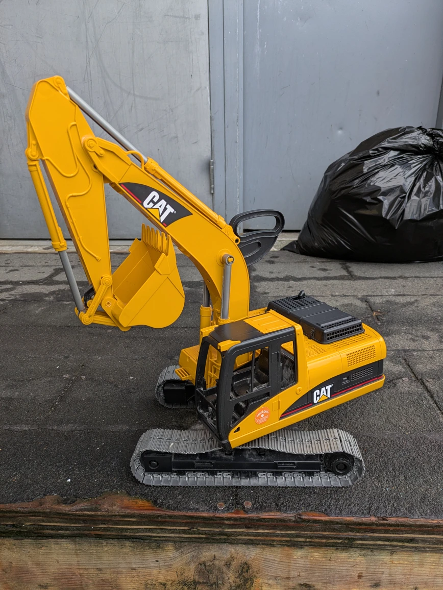 Excavator Toy Cat  , Bruder (plastic )  2001