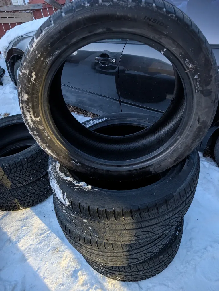 Set of 4 like new Hankook wintercept  245/45r18