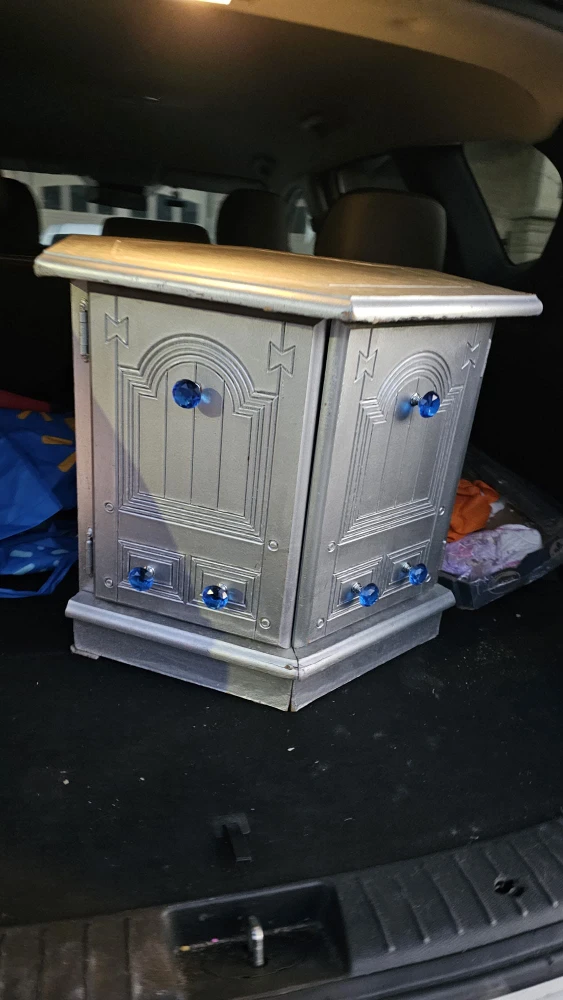 Silver Cabinet with Blue Knobs