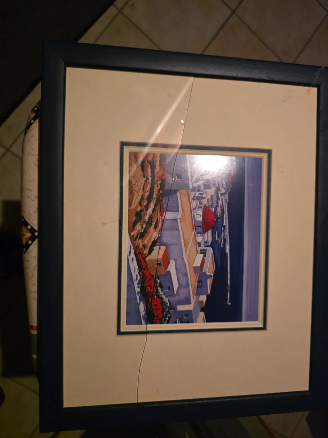 Framed picture with cracked glass