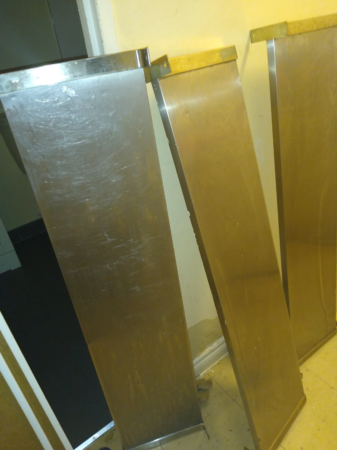 Set of three stainless steel shelves