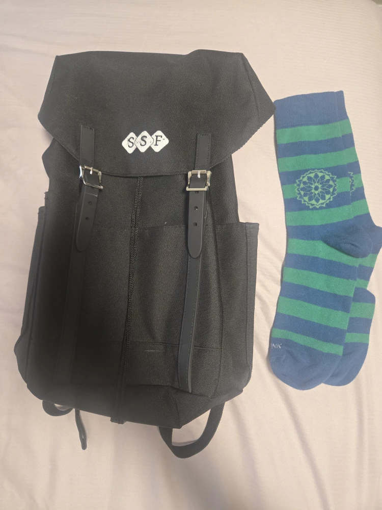 Small Black Backpack and pair of socks #gifting