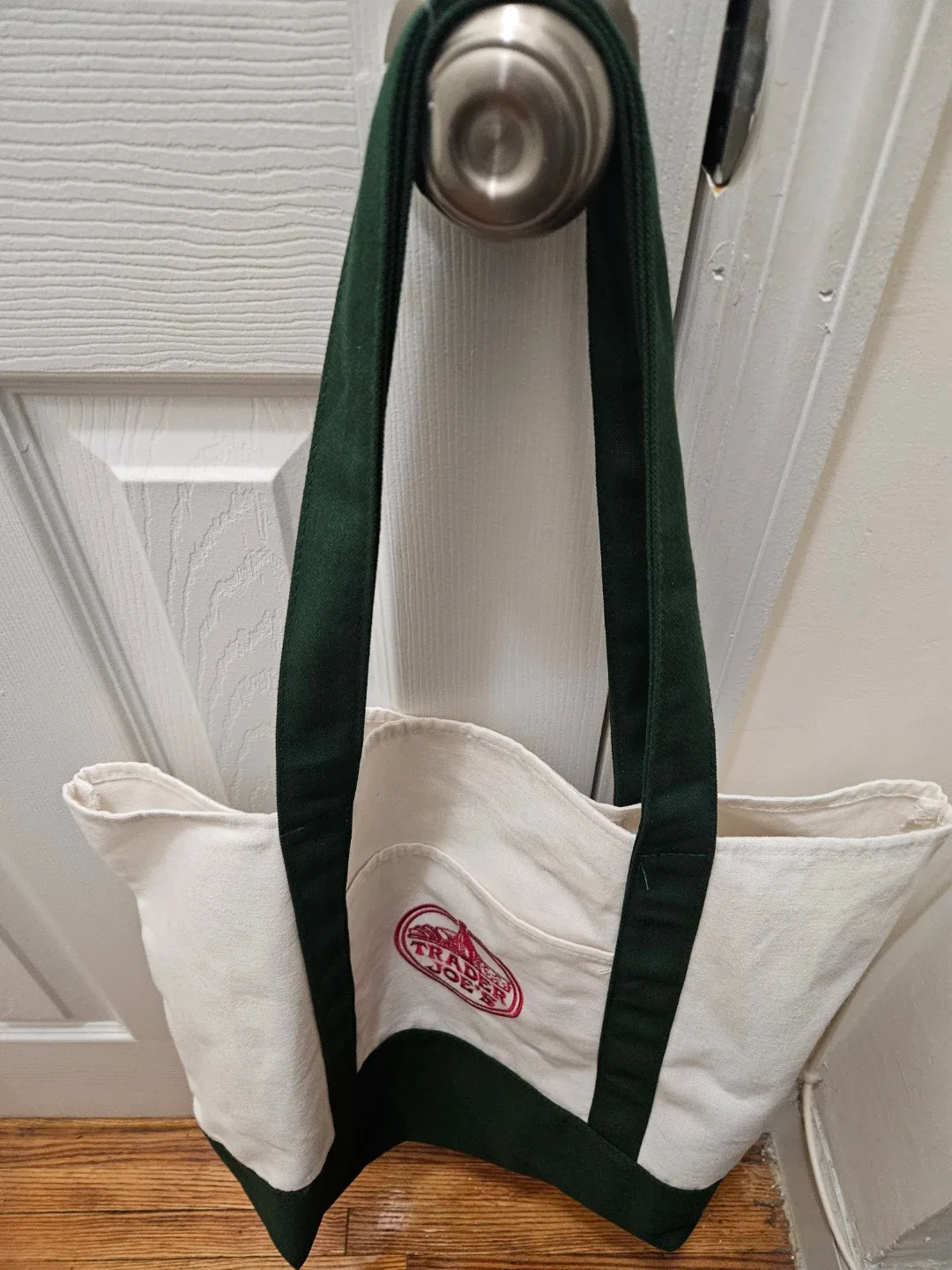 Trader Joe's Large Canvas Tote With Green Handles.