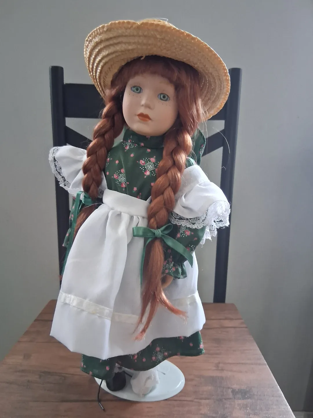 Porcelain Doll with Straw Hat
