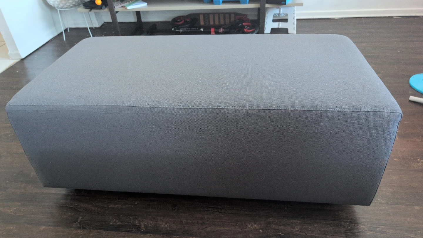 Grey Ottoman with soft cushion and without storage