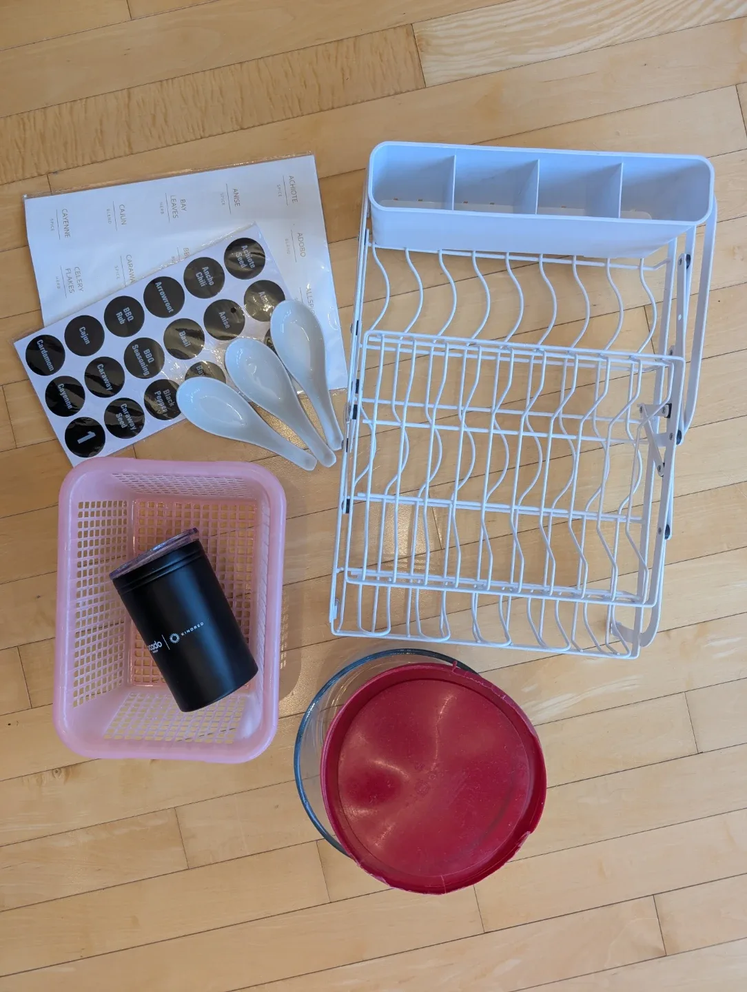 Lot of kitchen items - dish drying rack, soup spoons, basket