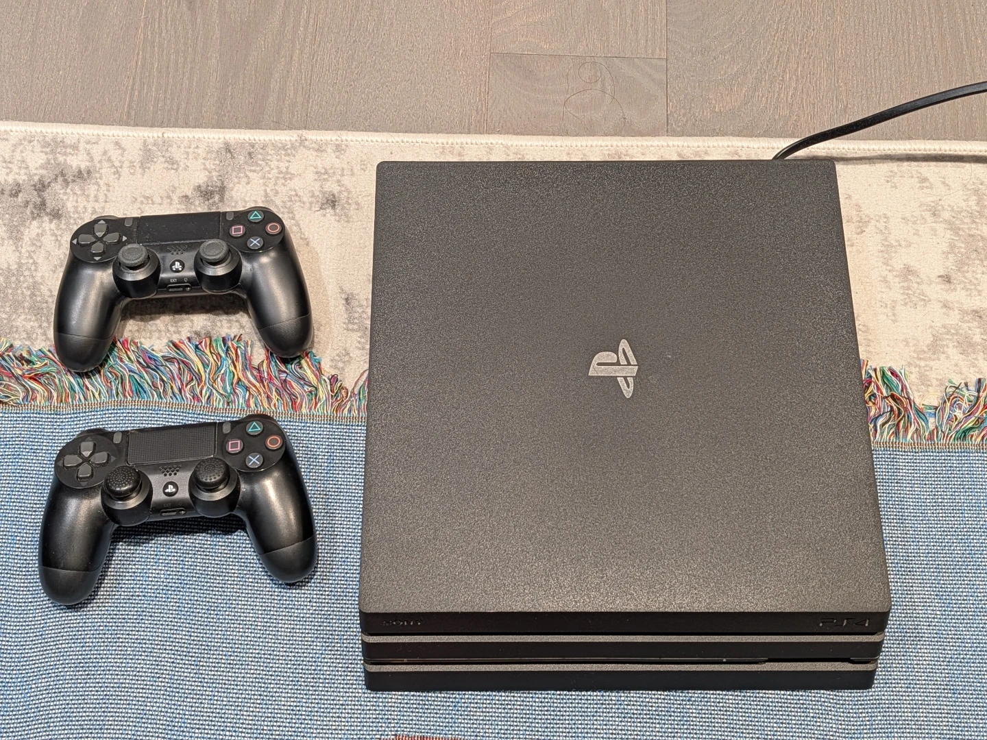 Sony PlayStation 4 Pro 1TB with 2 DualShock controllers - photo 2