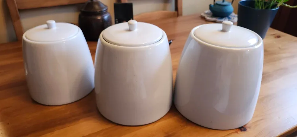 Set of 3 White Ceramic Canisters image indicator(2)