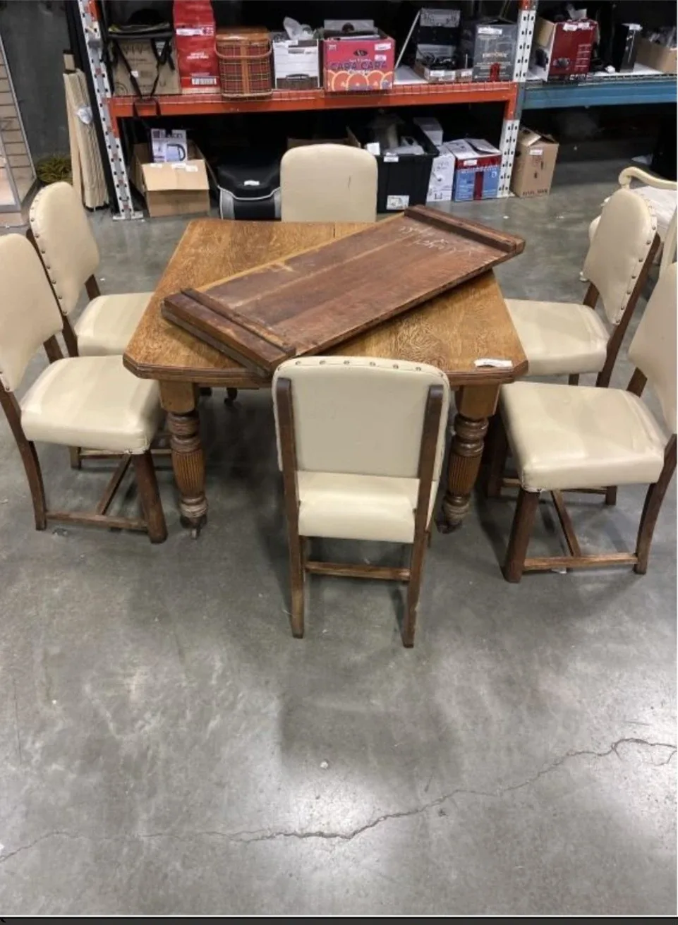 ANTIQUE OAK DINING TABLE AND 6- LEATHER CHAIRS