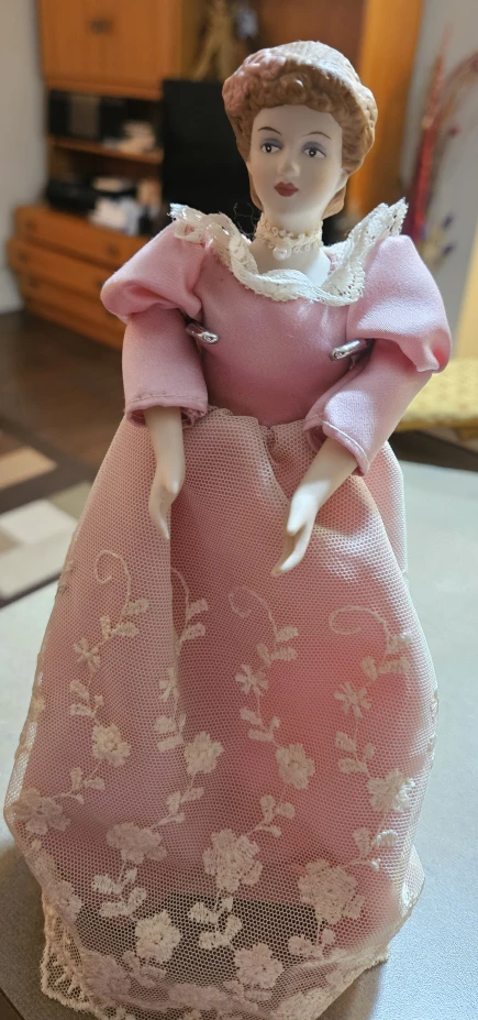 Porcelain Doll in Pink Dress