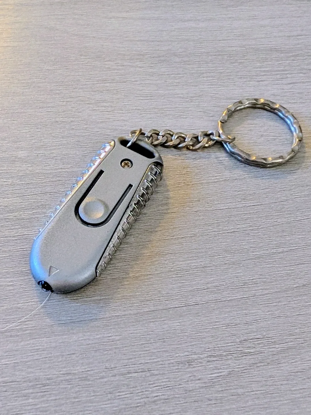 Silver Keychain with Red Laser Pointer Light