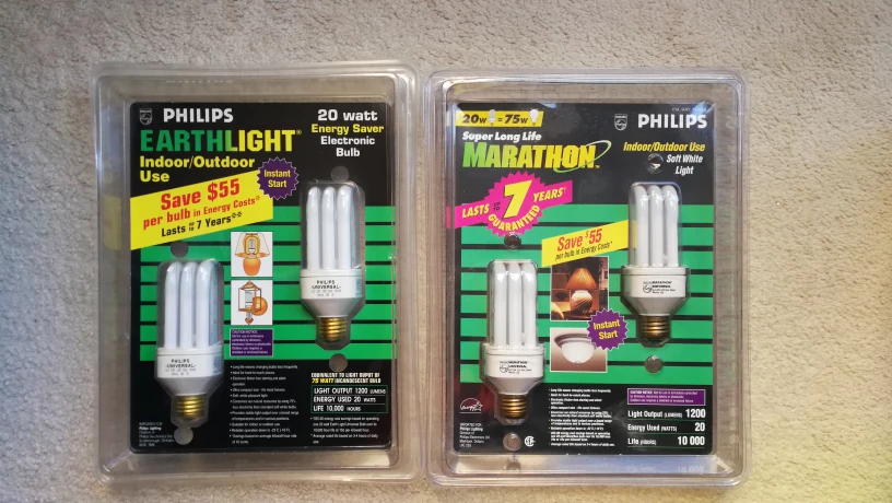 4 New Philips marathon energy saving light bulbs