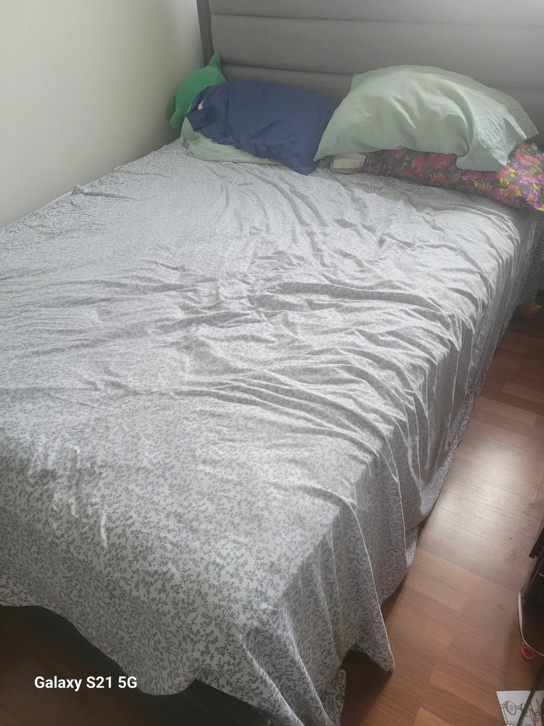 A bed set together with a mattress, a side dresser with a mirror
