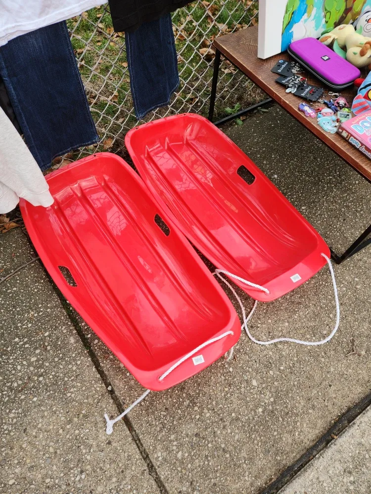 Red Plastic Toboggan Sled