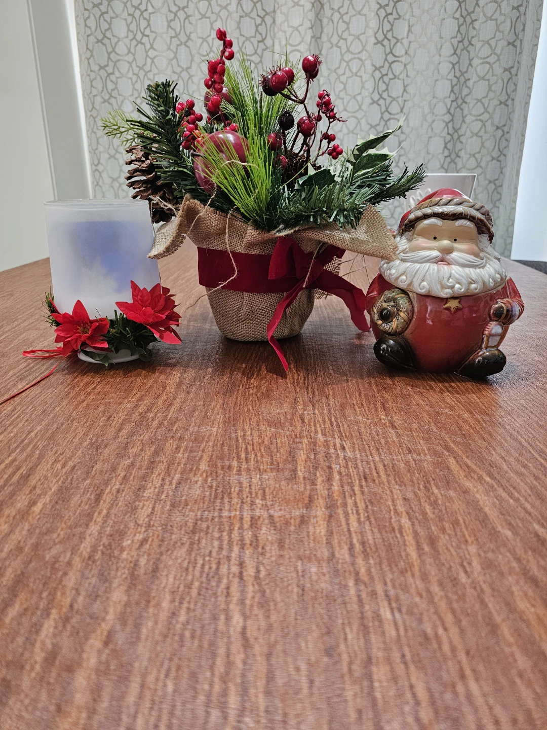 Christmas Decorative Arrangement and Santa Figurine