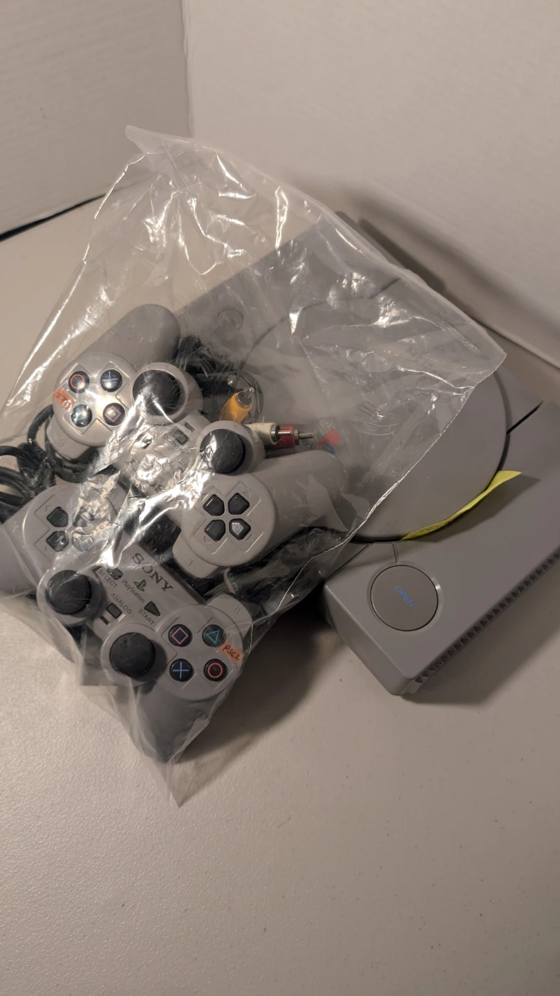 Sony PlayStation Console with Accessories