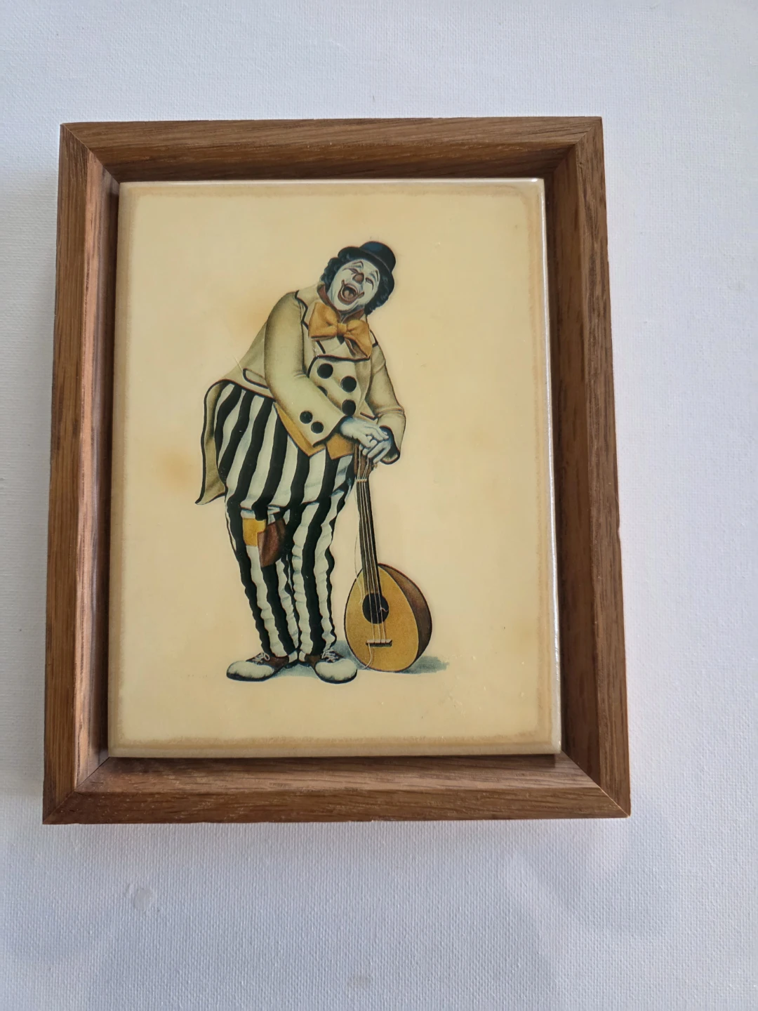 Clown Picture in Wood Frame on ceramic tile