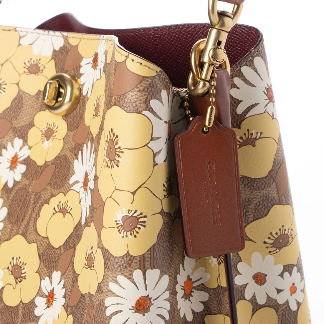 Coach Willow Bucket Bag with a vintage-inspired floral