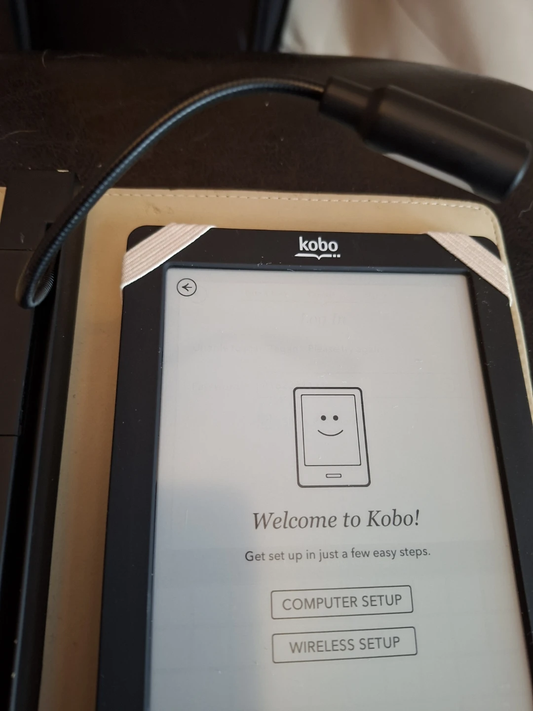 Kobo eReader with Cover and light.