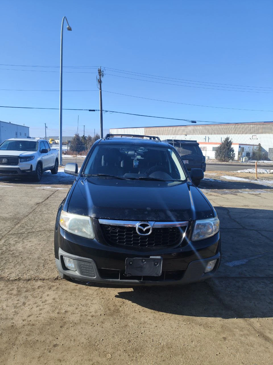 Black Mazda Tribute 2008