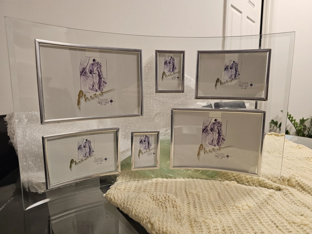 Curved glass , 6 picture silver border Photo Frame