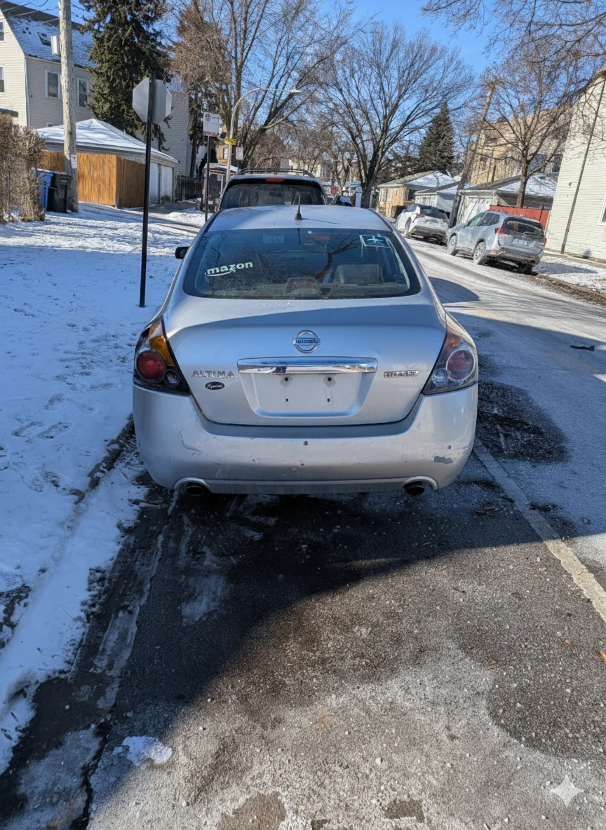 Silver Nissan Altima Sedan