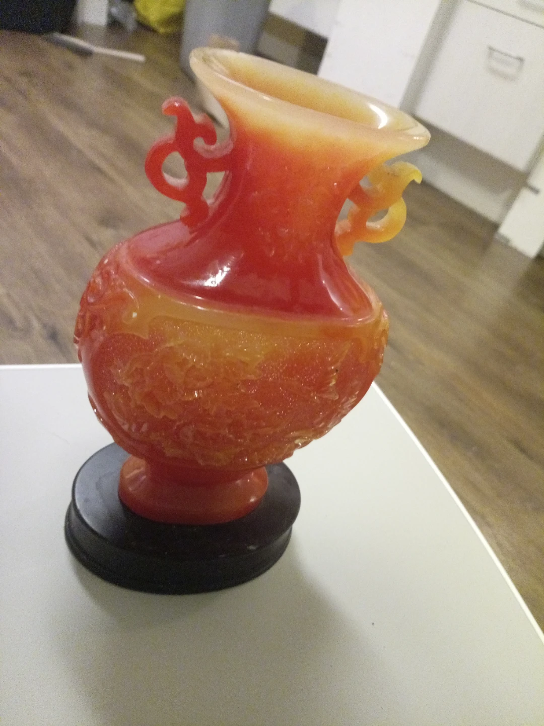 Orange and Red Swirl Glass Vase with Black Base