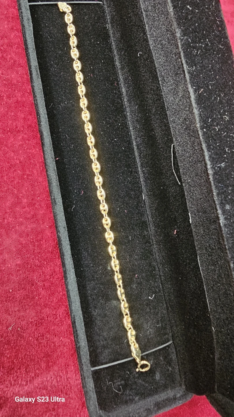 Gucci woven gold bracelet, 14 karat