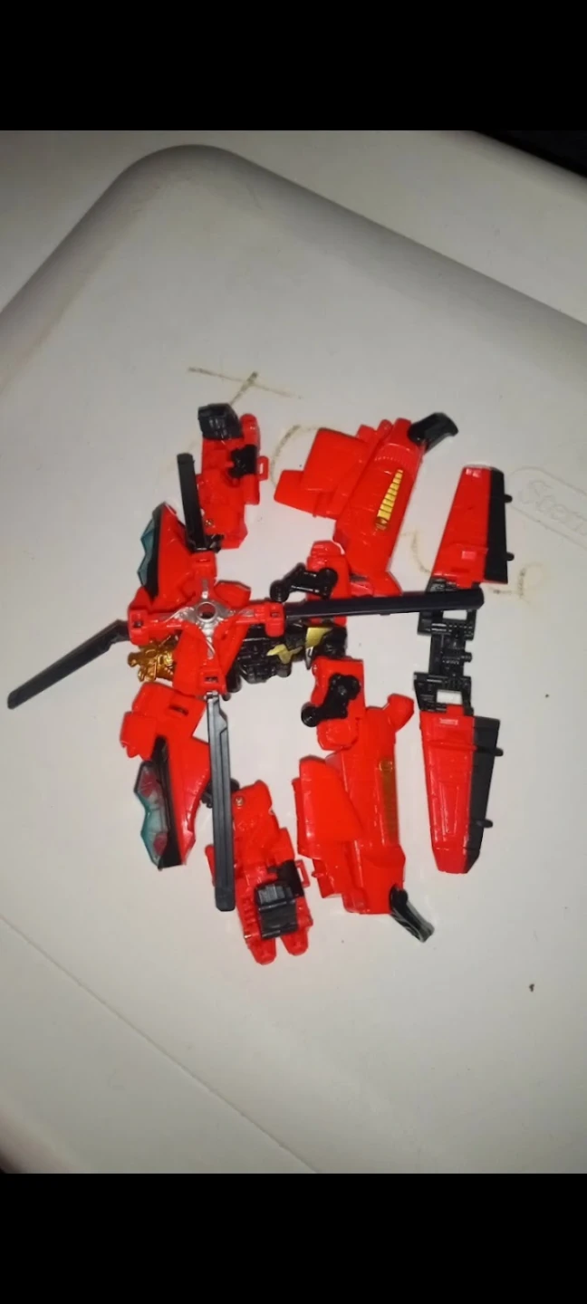 Red and Black Robot Action Figure