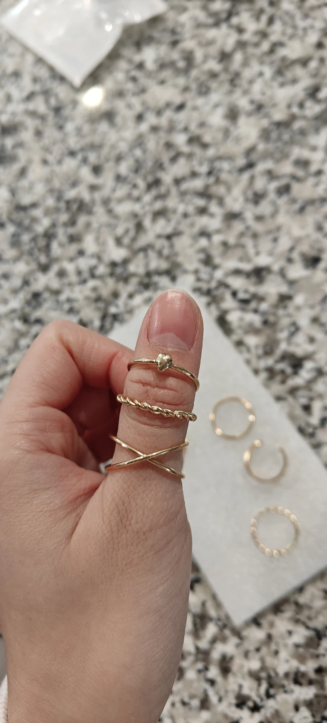 Set of Gold coloured fashion rings