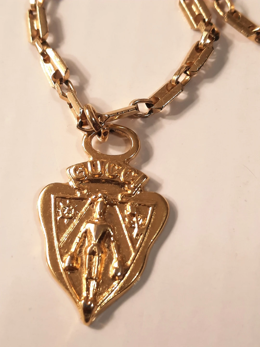 Gucci Gold Tone Necklace with Crest Pendant