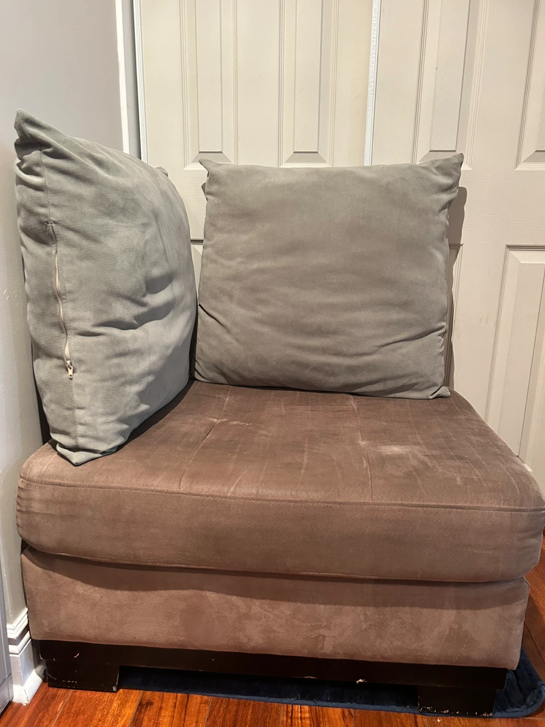 Brown Ottoman with Green Cushions