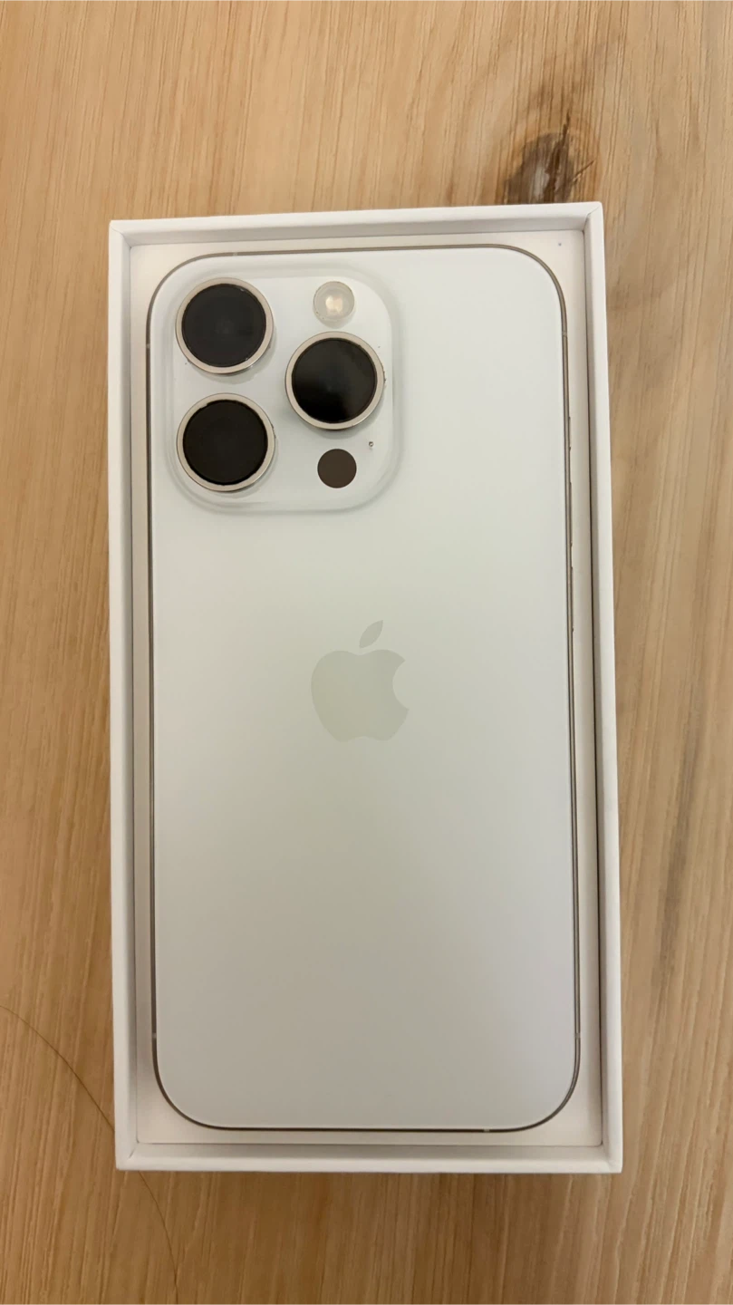 New iPhone 15 pro titanium white 128gb - photo 2