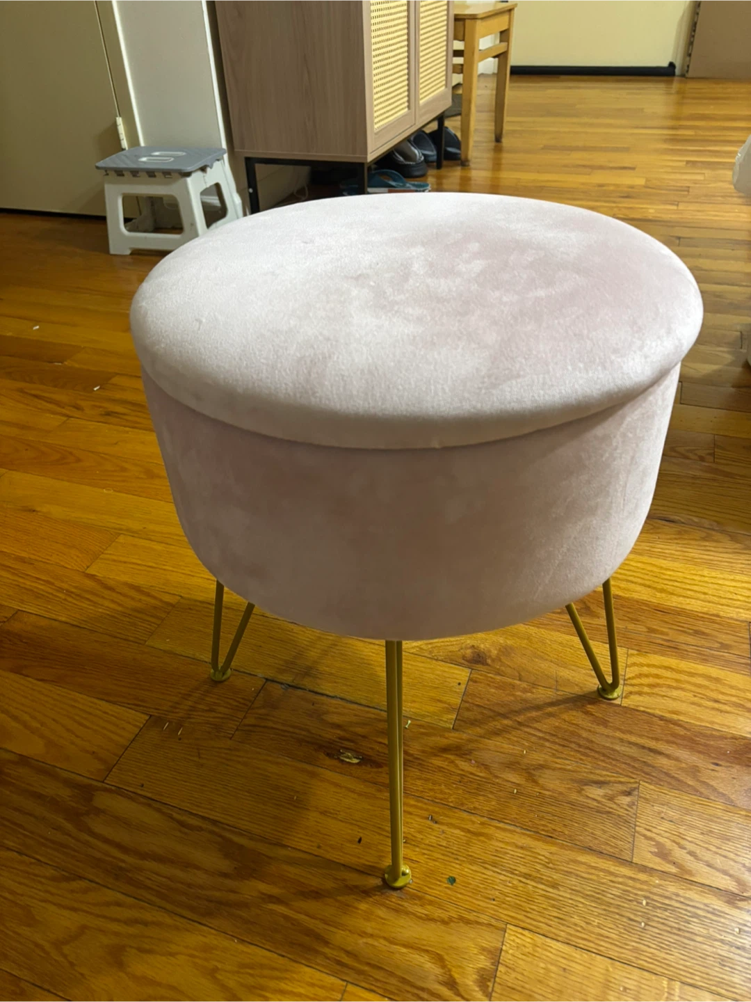 Pink velvet round ottoman