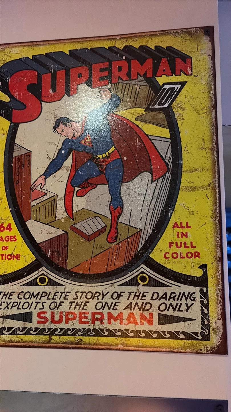 Multi pieces of Superman art