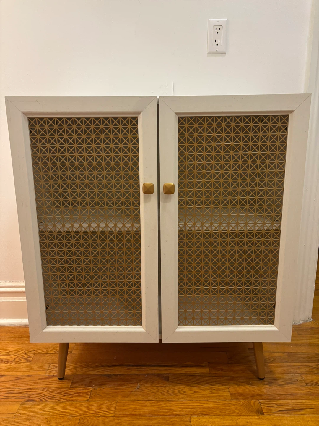 White Wood Cabinet with Gold Geometric Door