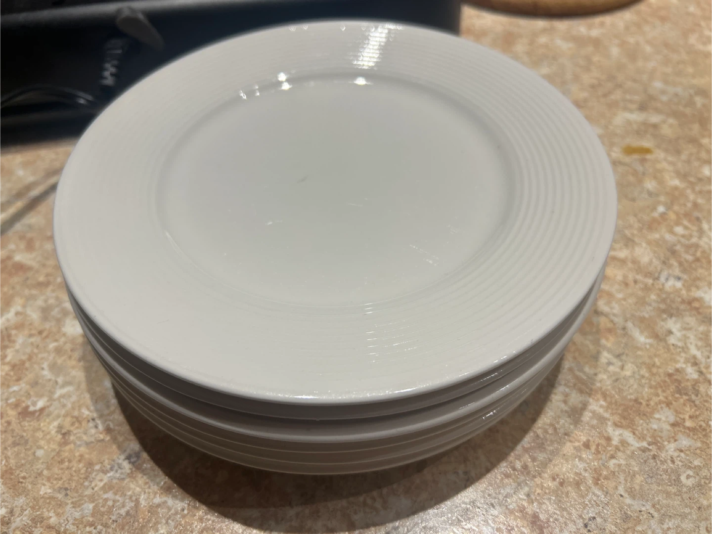 Set of 6 (plus 1) White medium size  Plates.