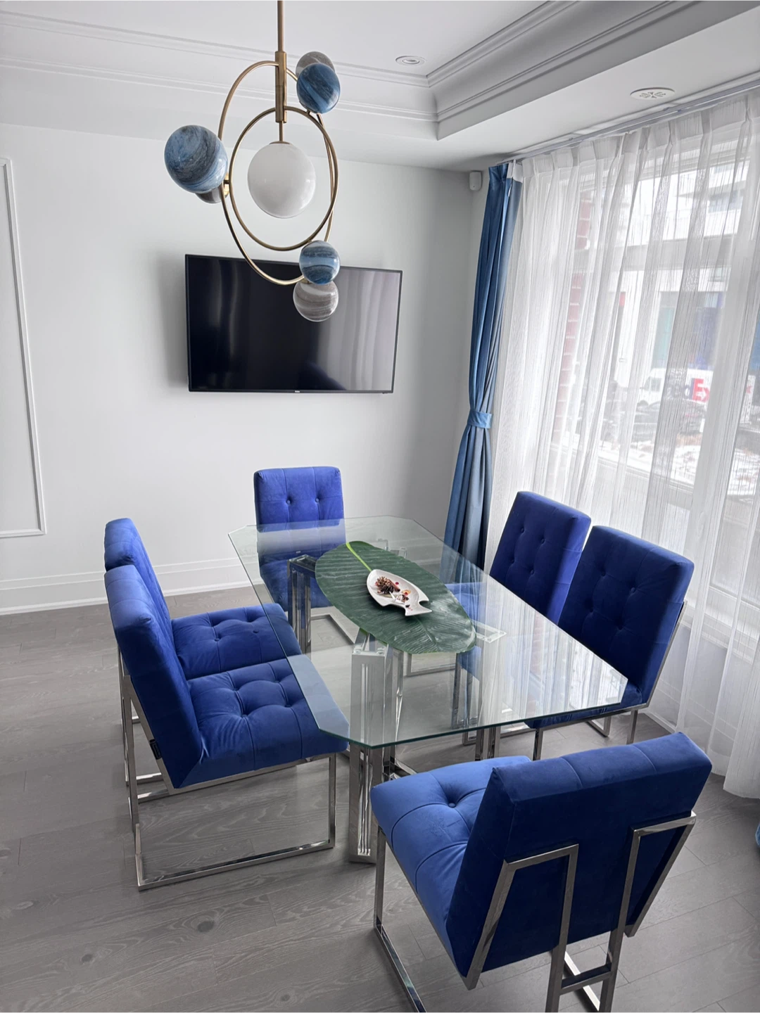 Glass Dining Table with 6 Blue Velvet Chairs