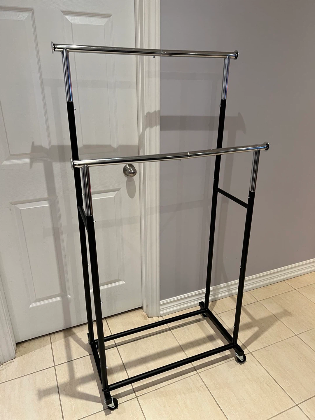 Adjustable Double Rail Rolling Clothes Rack